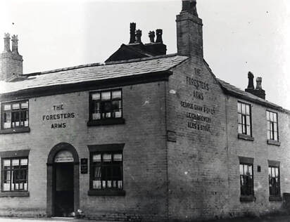 black and white picture of old public house